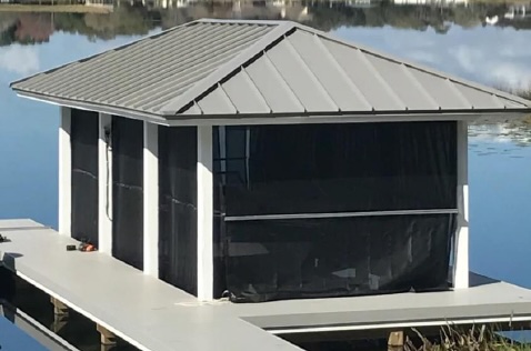 ShoreScreen Power Curtain used on a boathouse and canopy setup