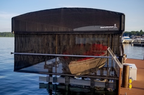 ShoreScreen Power Curtain moving to uncover the boat quickly